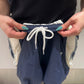 VOLUMINOUS NYLON SHORTS