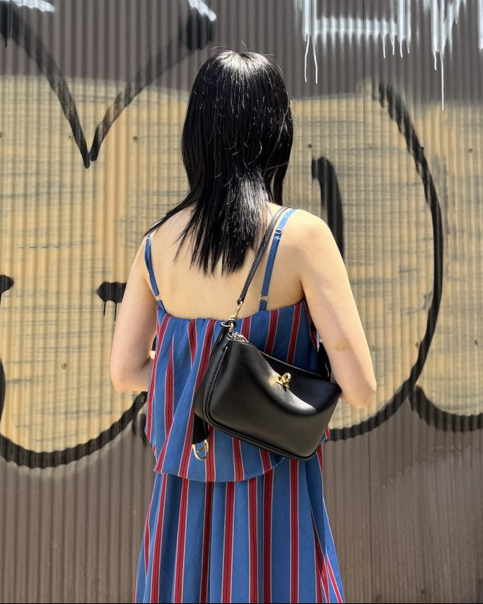 RODEO SLING POUCHETTE